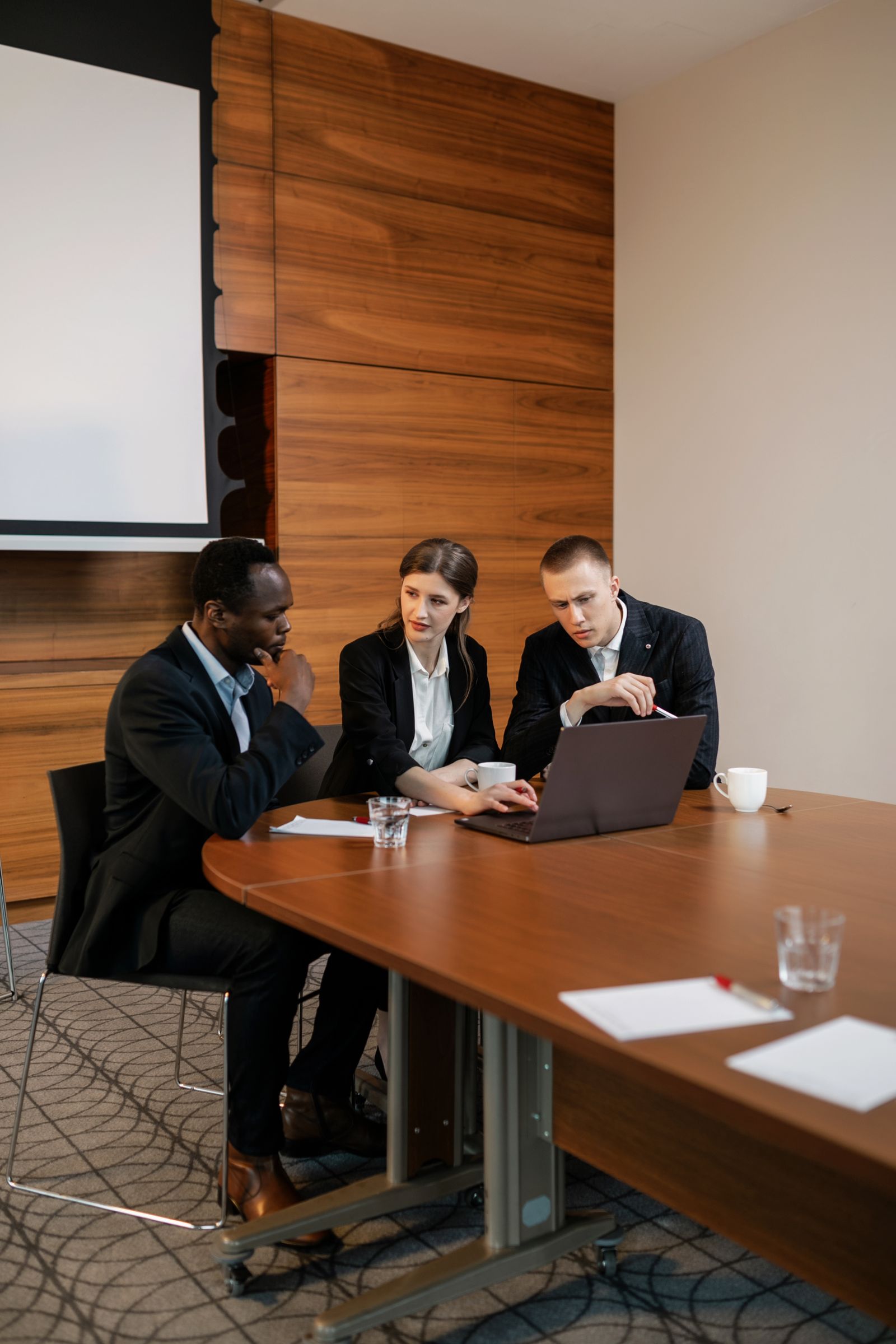 A professional conversation over work at a shared table